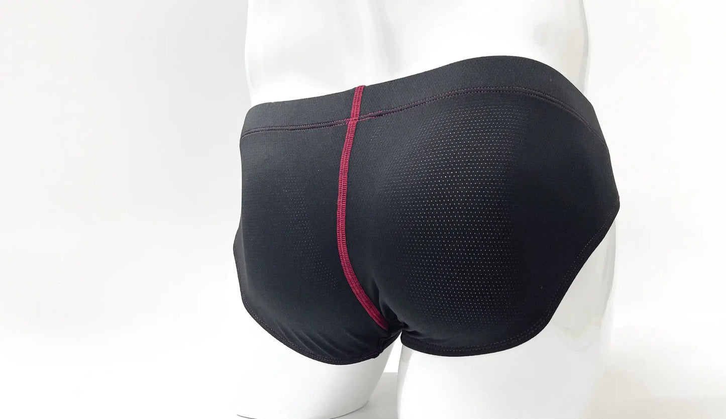 Black stitch big boy pouch brief with red vertical seam and breathable mesh texture for athletic use