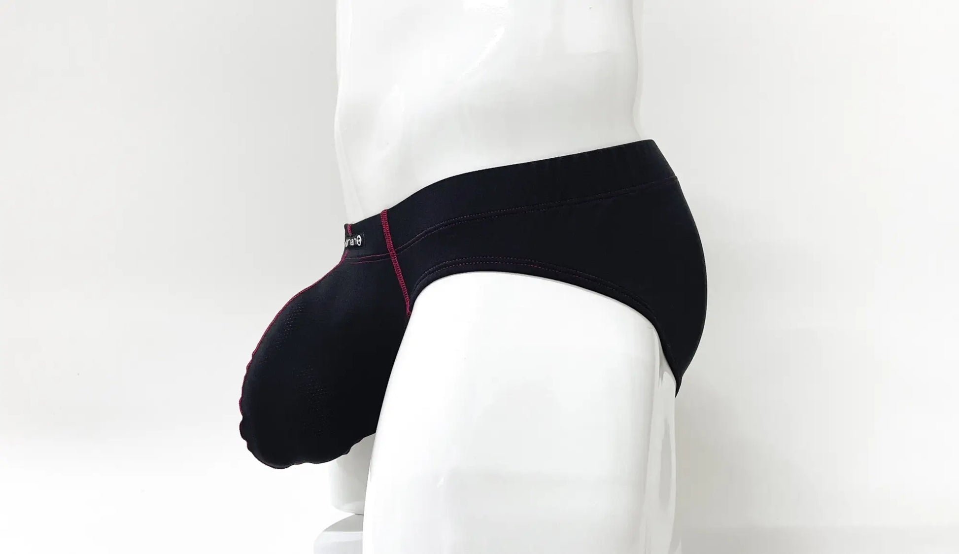Black men’s briefs with subtle red stitching along the side seam from stitch big boy pouch brief red collection