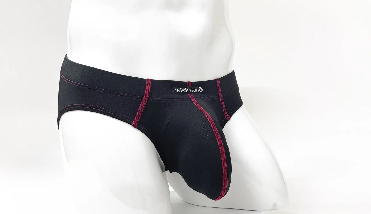 Black men’s briefs with red stitching and wildman brand label on waistband from stitch big boy pouch brief red collection
