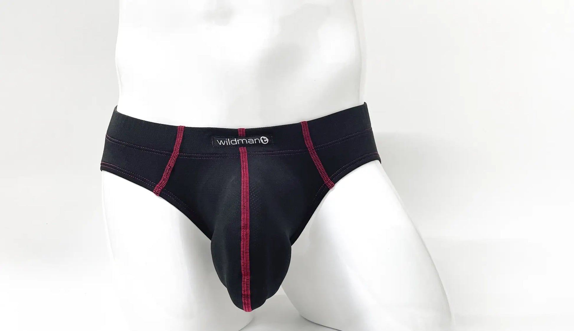 Black men’s Stitch Big Boy pouch briefs in cotton with red stitching and a Wildman brand label