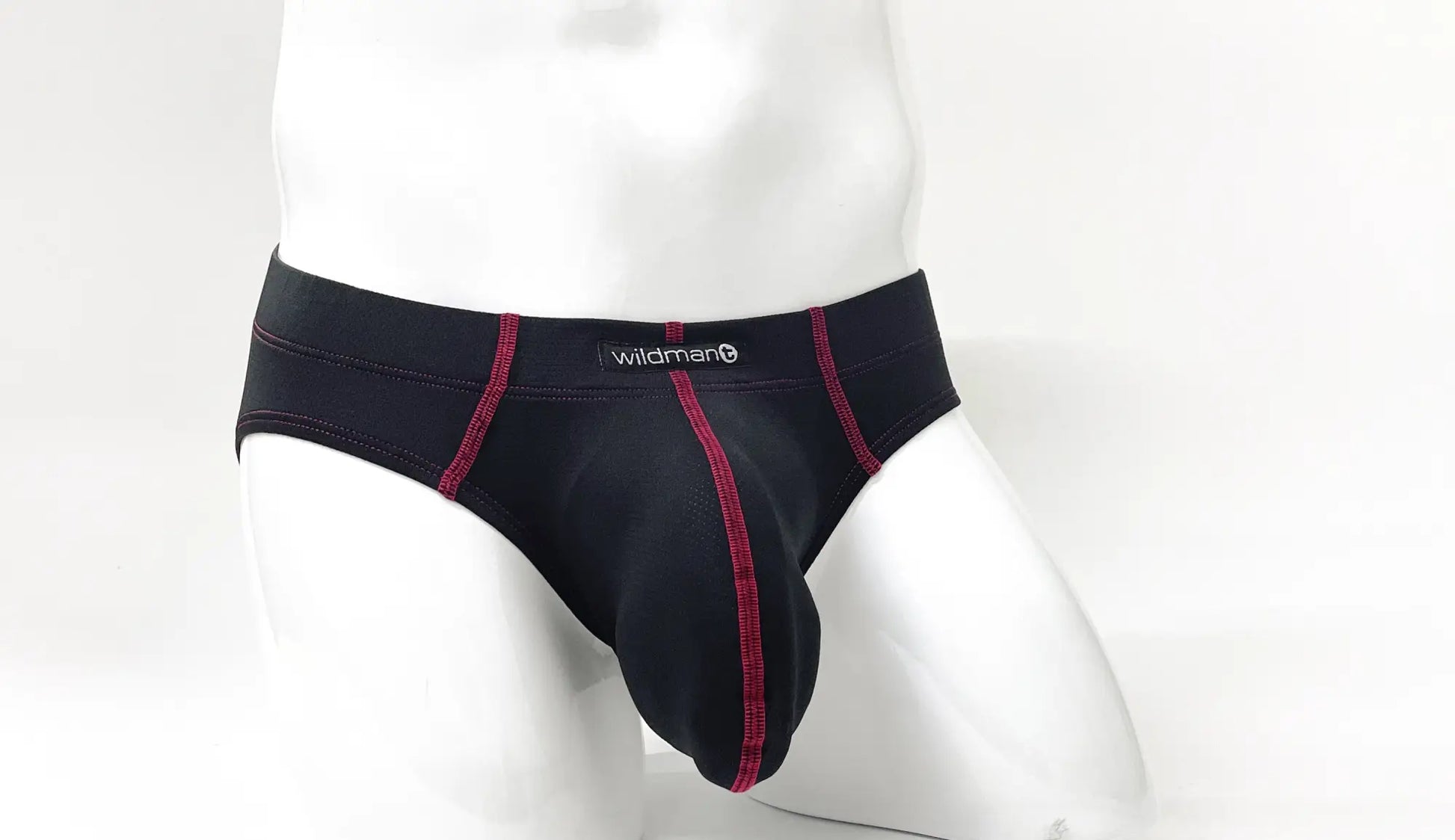Black men’s Stitch big boy pouch briefs with contrasting red stitching and wildman brand label on waistband