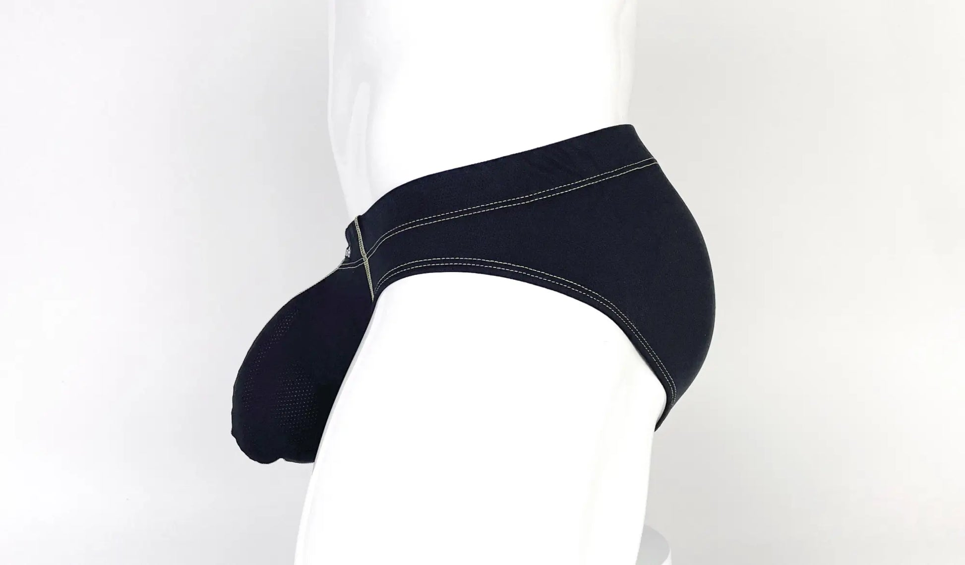 Black men’s stitch big boy pouch briefs in yellow with white stitching and mesh side panel for breathability