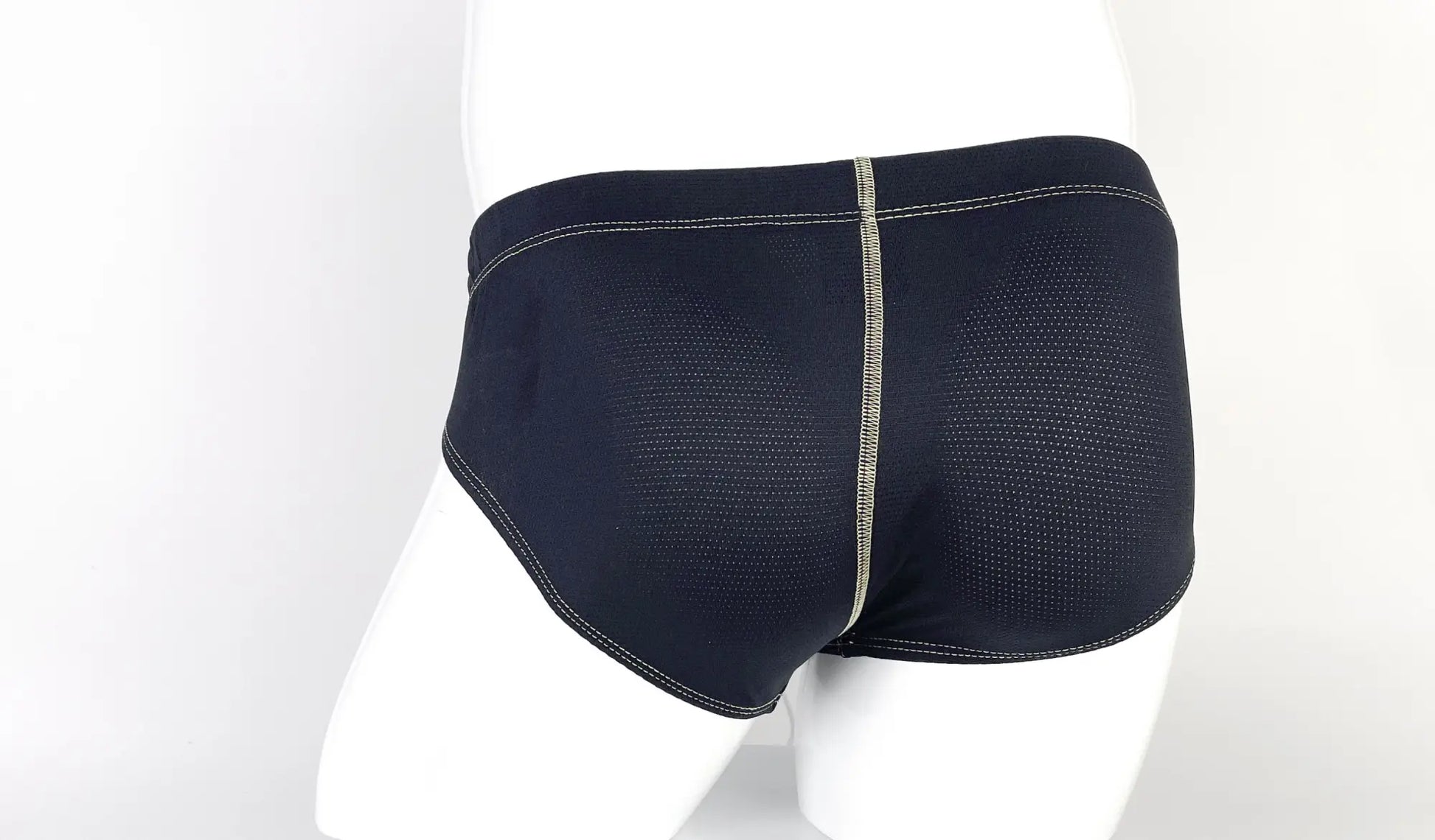 Yellow stitch big boy pouch brief in black mesh with central seam and contrasting stitching on front side