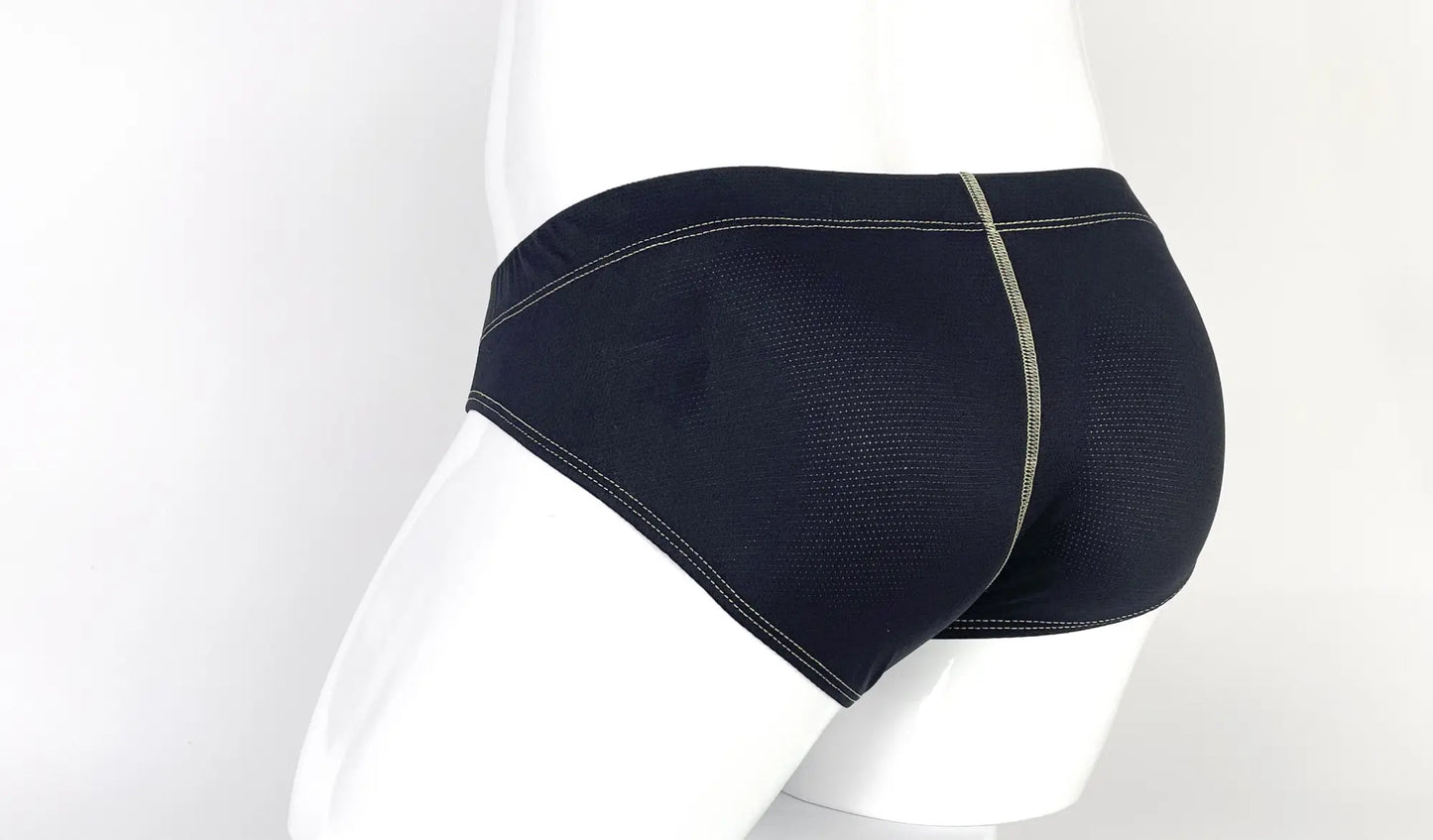 Black mesh stitch big boy pouch brief with yellow waistband and gray contrasting stitching on leg openings