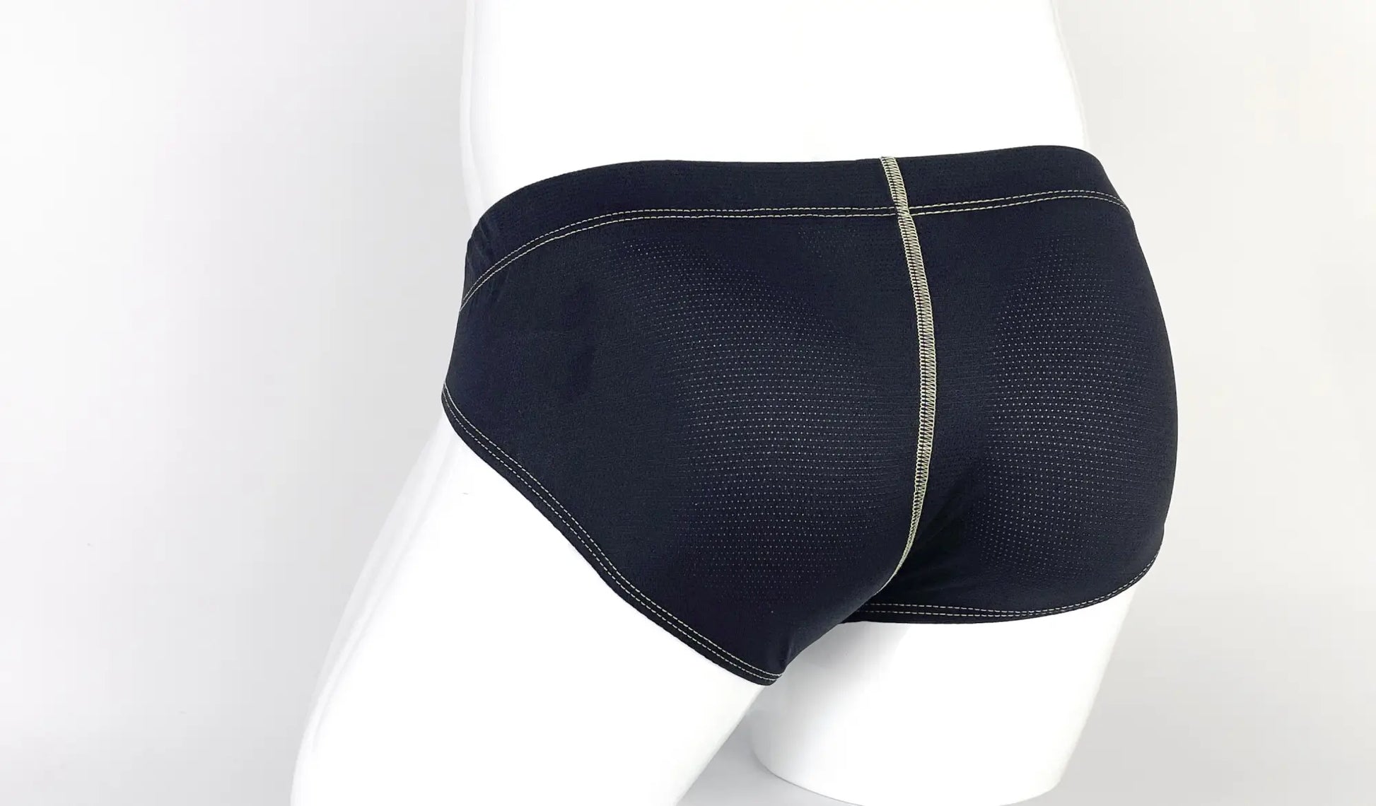 Black mesh stitch big boy pouch brief with subtle gray center seam and yellow accents for comfortable support
