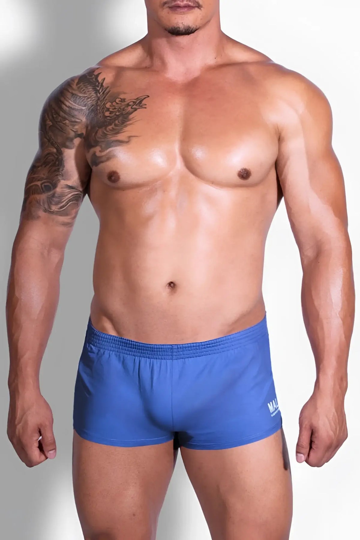 Blue stretch-it 2 inch athletic shorts with stretch fabric and a small white logo on the lower right leg