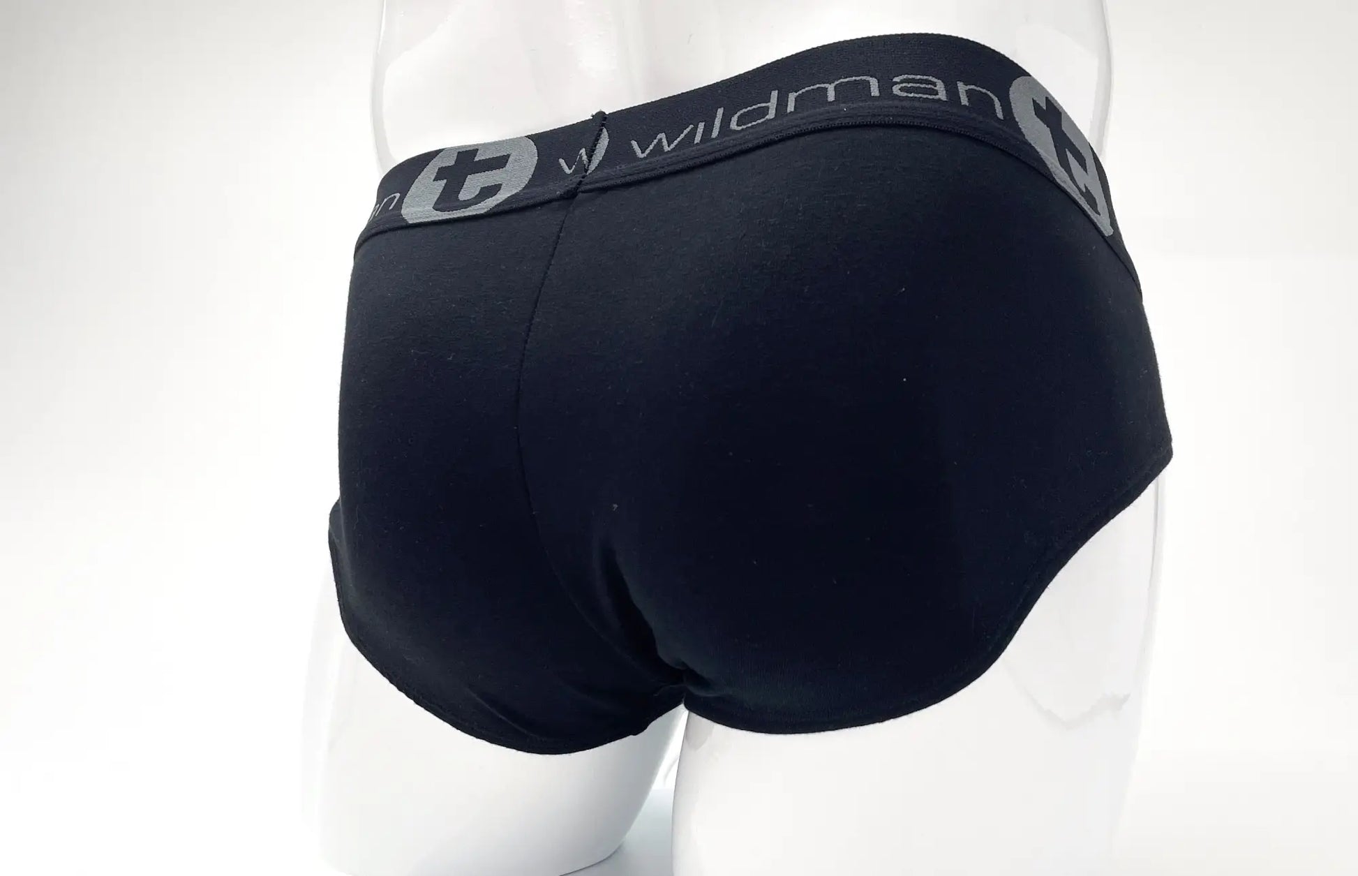 Black wildman brand stretch cotton big boy pouch brief in black with a gray logo waistband