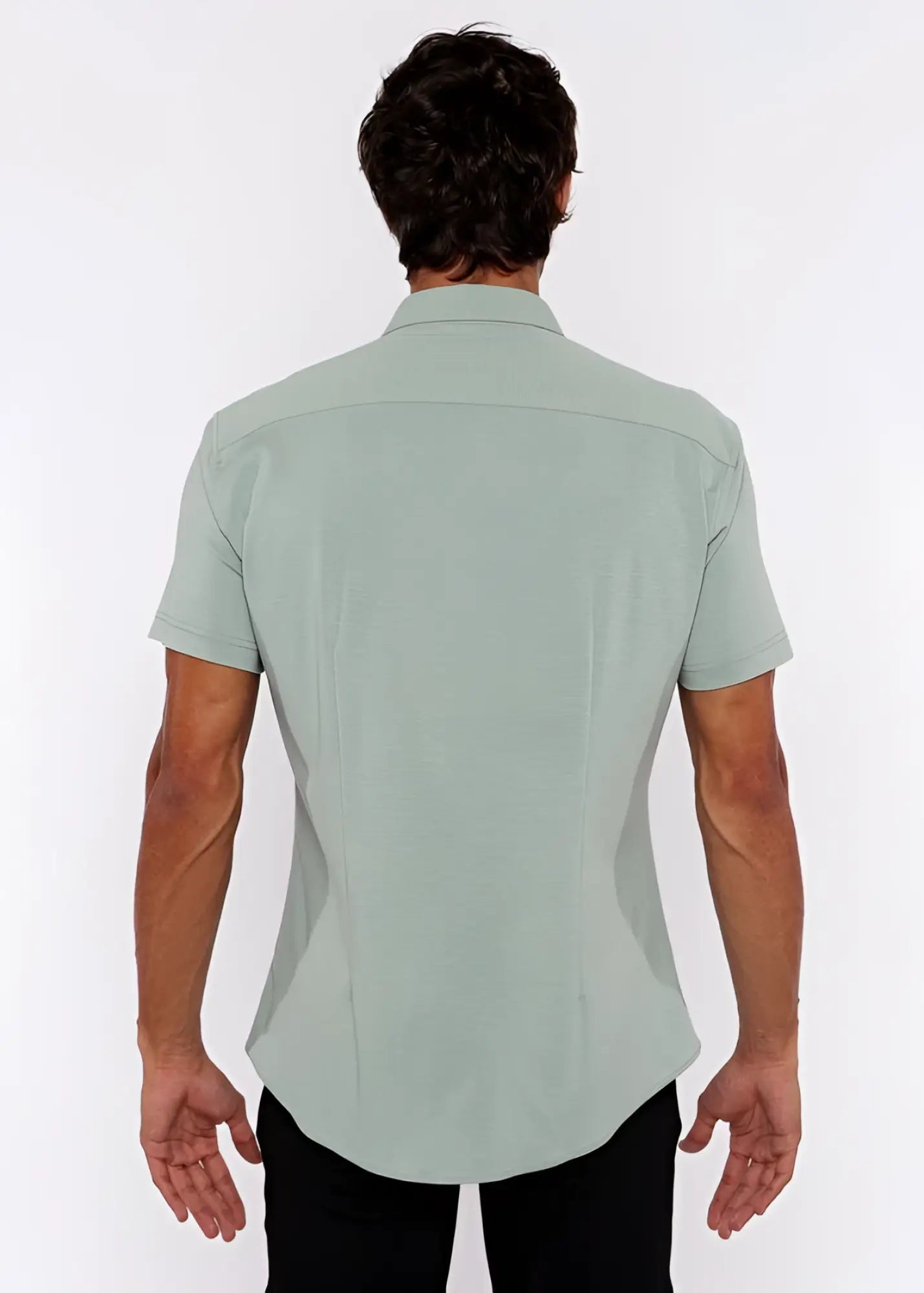 A light green stretch knit shirt for men with short sleeves tailored fit and subtle stitching details