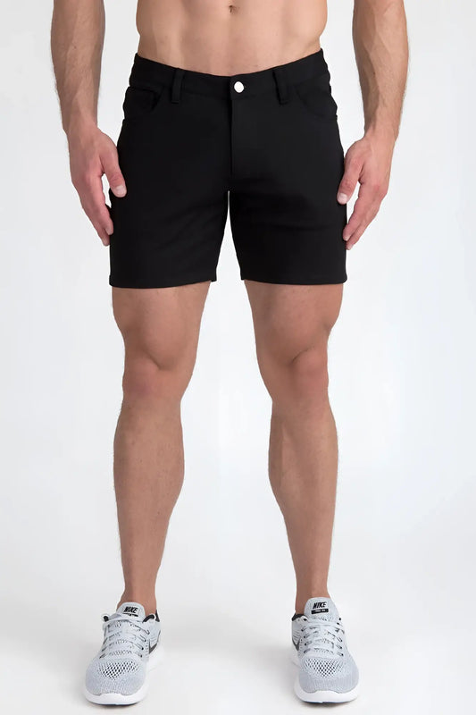 Black stretch knit shorts with a classic five-pocket design and a single white button closure
