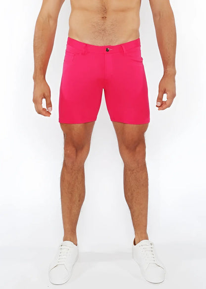 Bright pink stretch knit shorts for men with a tailored fit and single button closure