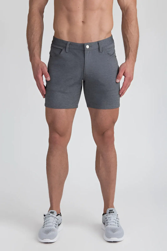 Gray stretch knit shorts with textured fabric button closure and side pockets for casual wear