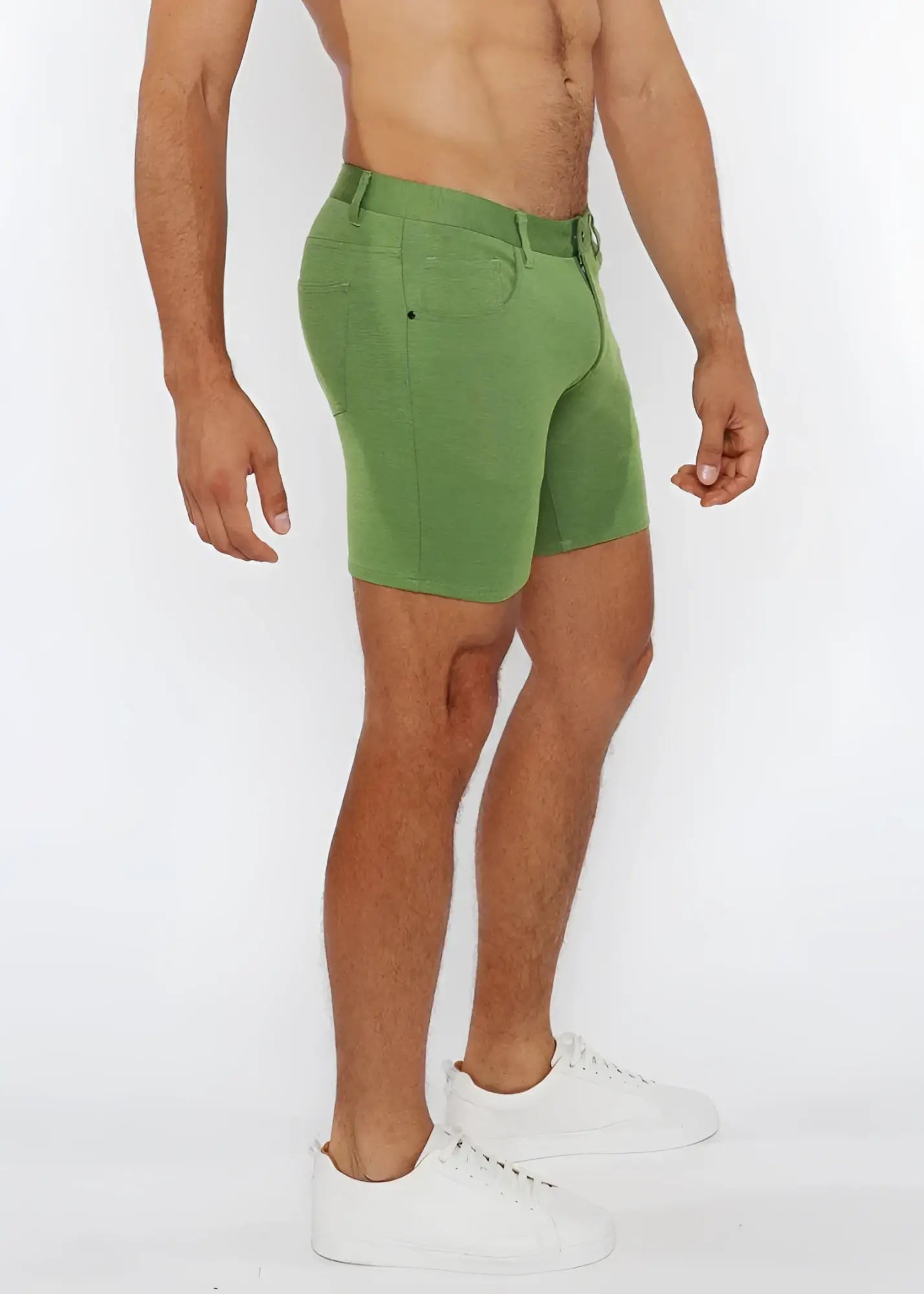 Green stretch knit shorts with classic five-pocket design and belt loop waistband in denim fabric