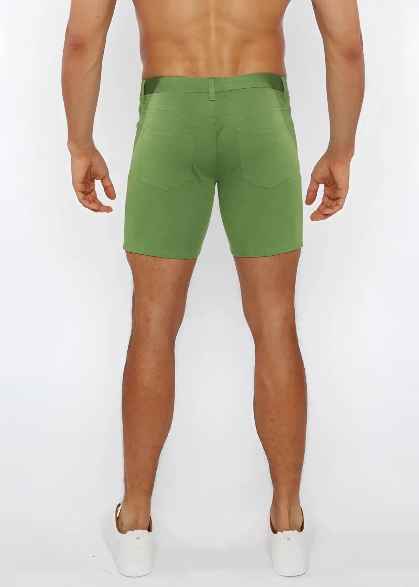 Green stretch knit short denim shorts with straight-leg cut and rear pockets shown from the back side