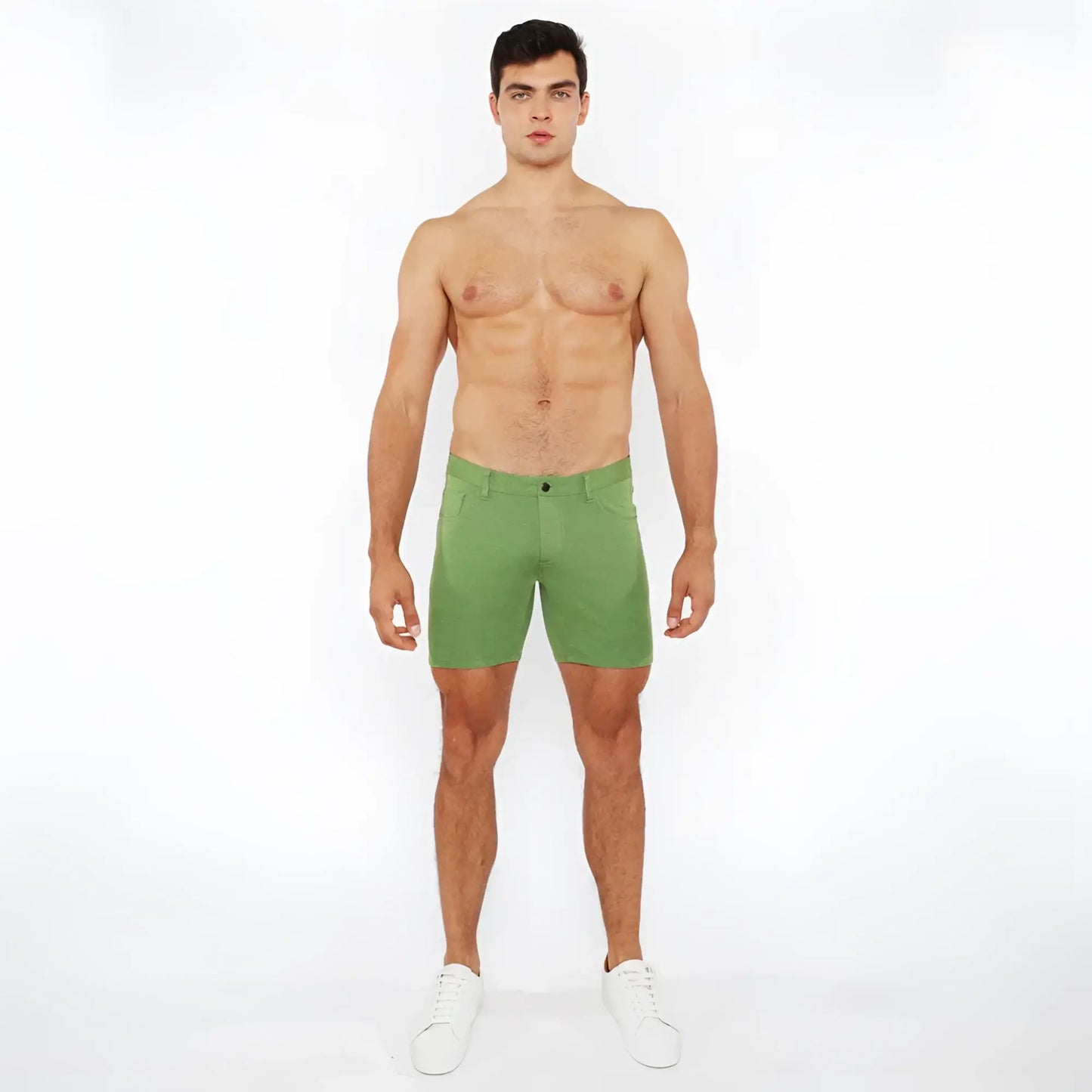 Green stretch knit shorts with a clean tailored fit and subtle stitching details