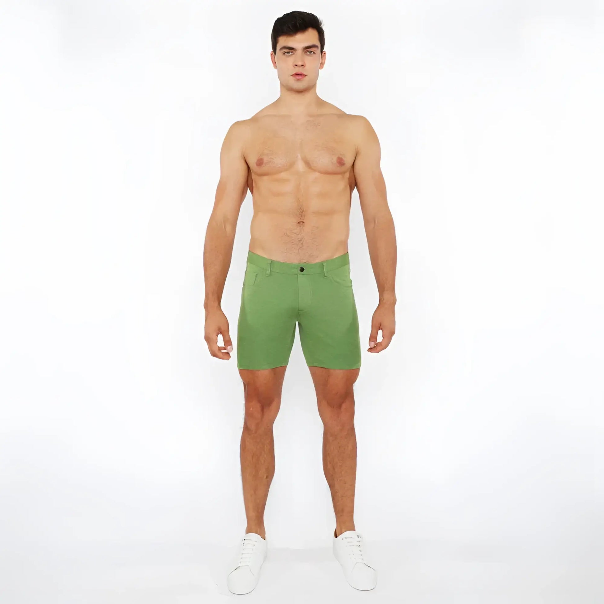 Green stretch knit shorts with a clean tailored fit and subtle stitching details