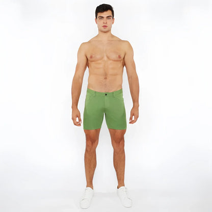 Green stretch knit shorts with a clean tailored fit and subtle stitching details