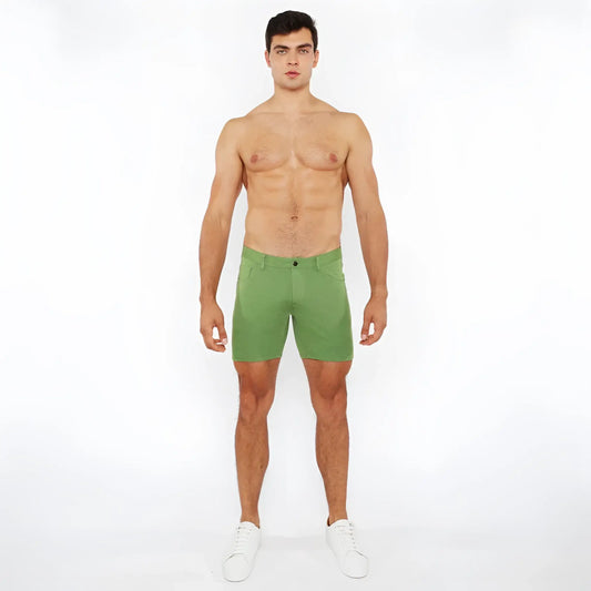Green stretch knit shorts with a clean tailored fit and subtle stitching details