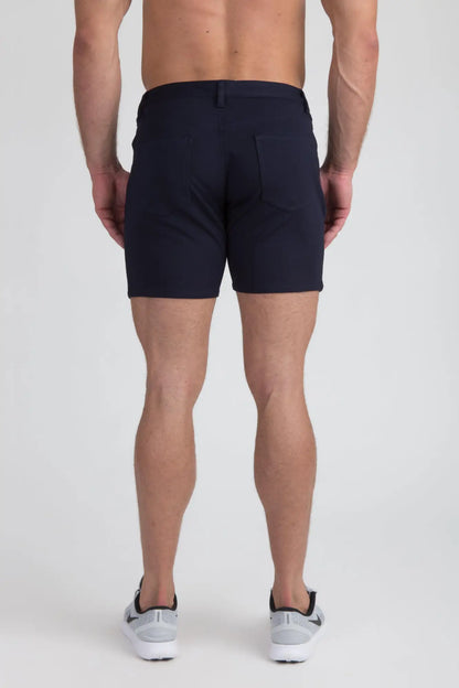 Navy blue stretch knit shorts with tailored fit and subtle stitching details for a sleek modern look