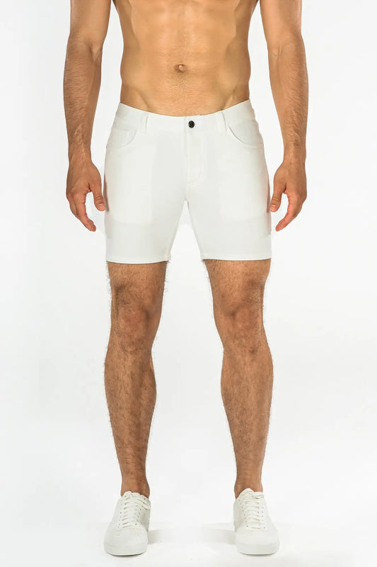 White stretch knit athletic shorts with sleek modern design and subtle stitching details