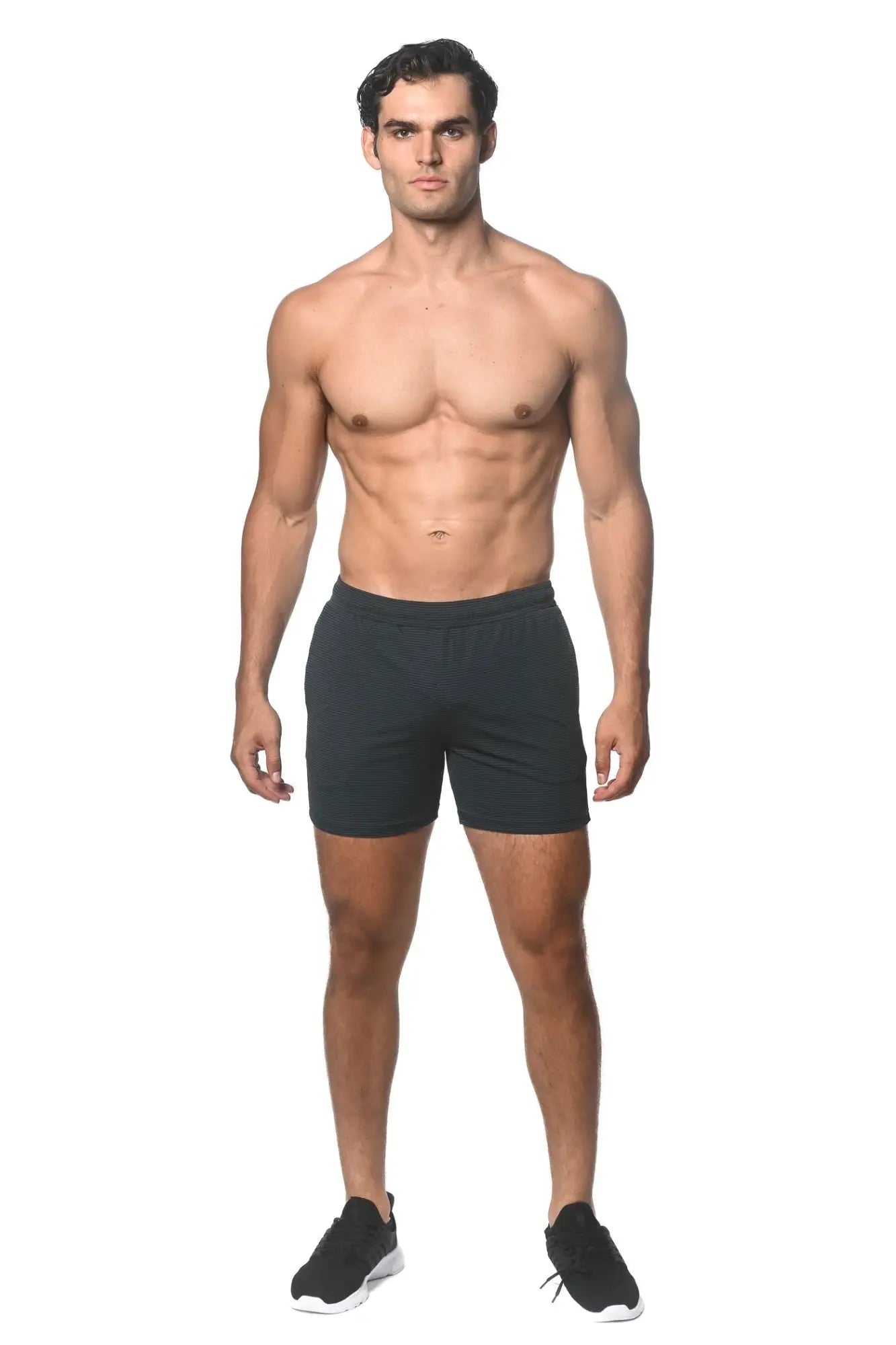 Black stripe stretch performance shorts with subtle textured pattern and elastic waistband for athletic use