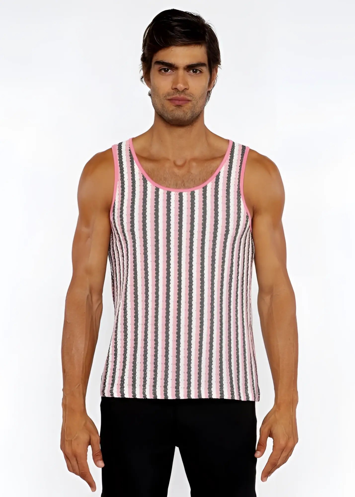 A man wearing a pink and gray striped open knit tank with pink trim around the neckline