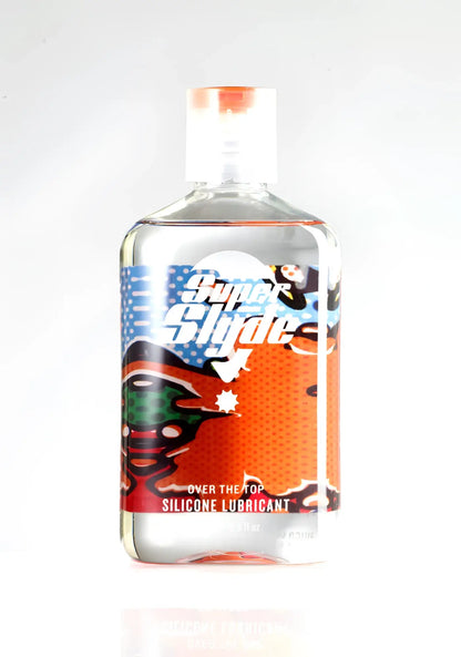 Clear plastic bottle of superslyde lube silicone lubricant with vibrant orange red and blue label branding