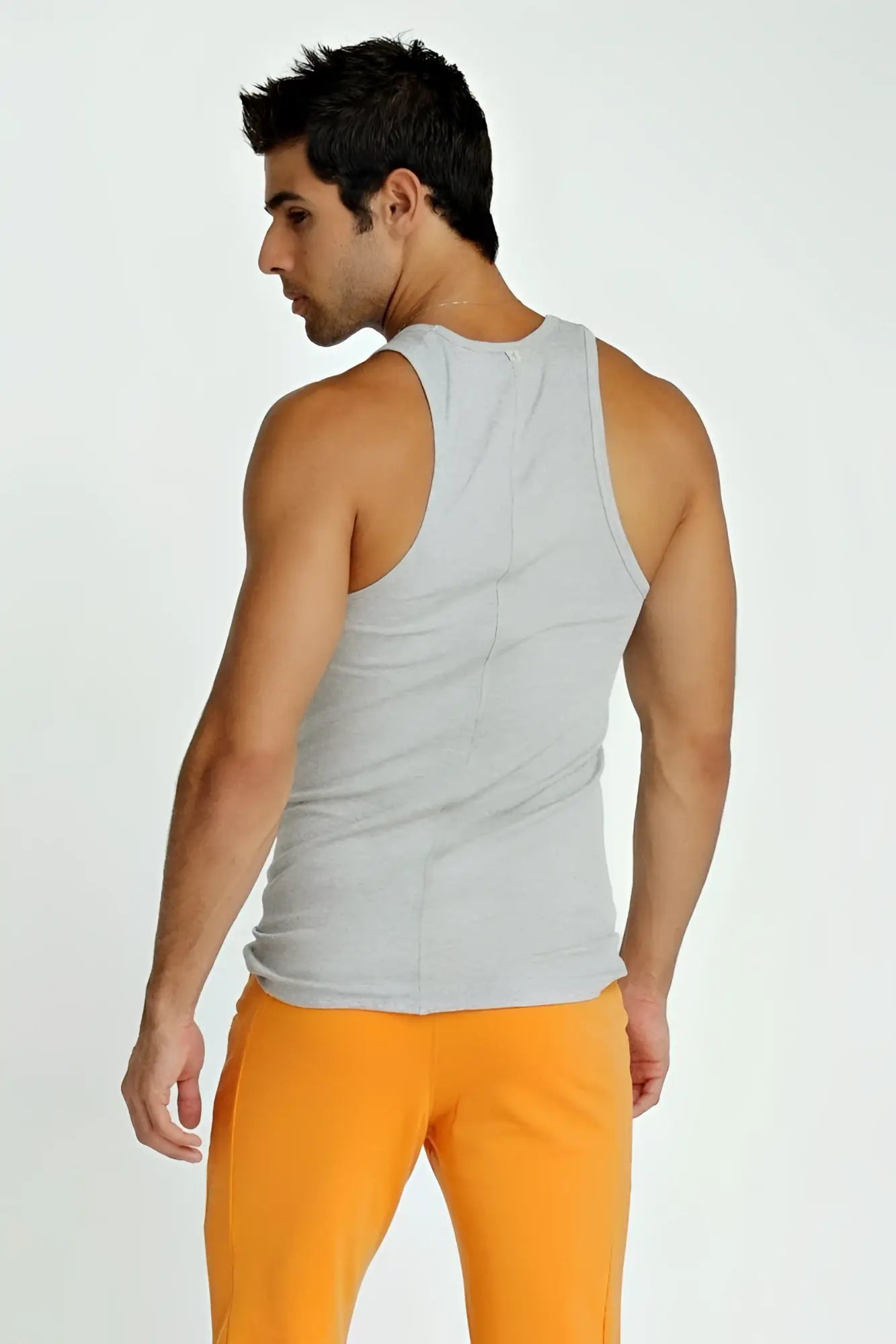 Gray sleeveless sustain tank top with a simple fitted design made from heather gray fabric for casual wear