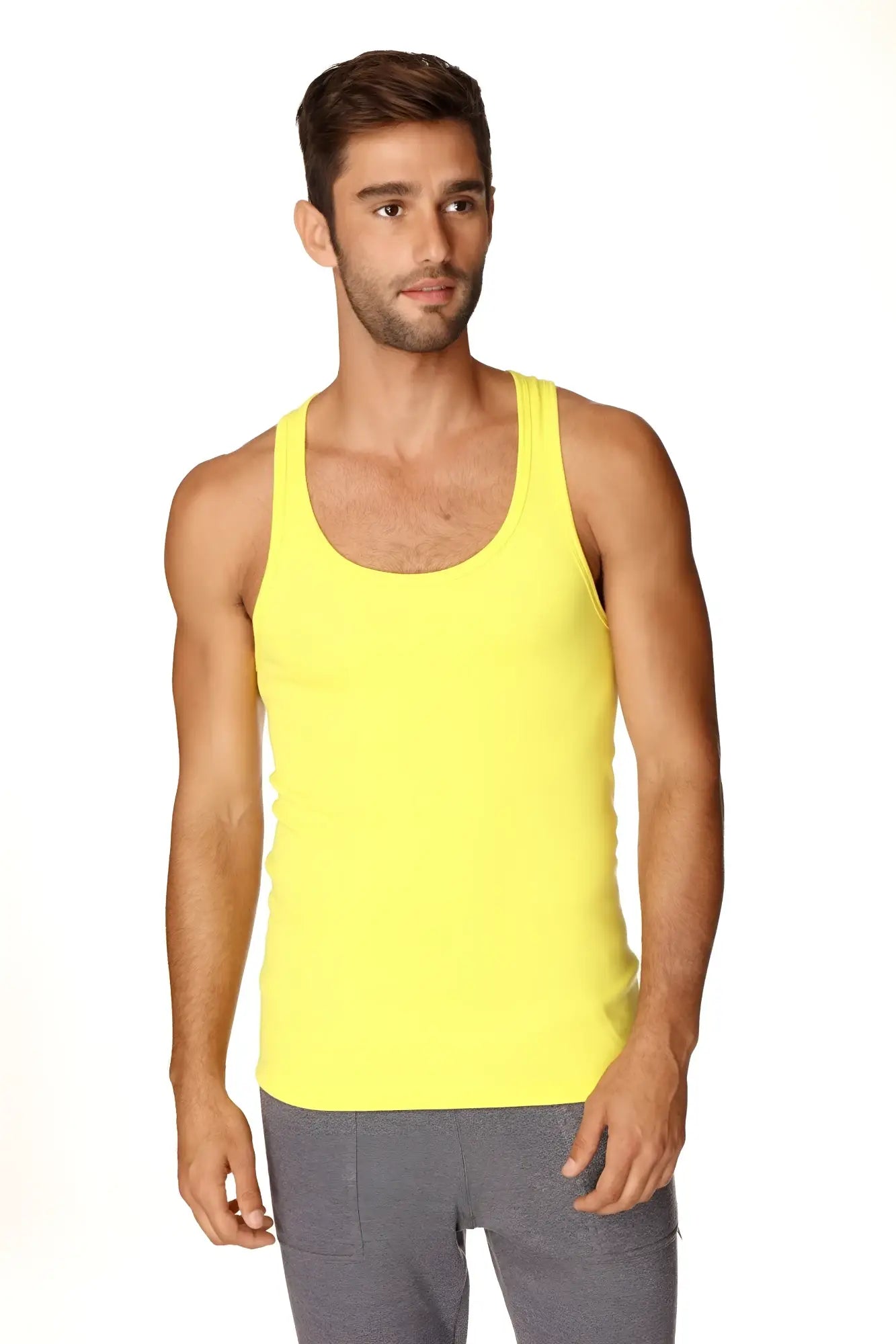 Bright yellow sleeveless sustain tank top with a simple fitted design perfect for casual wear in tropic yellow