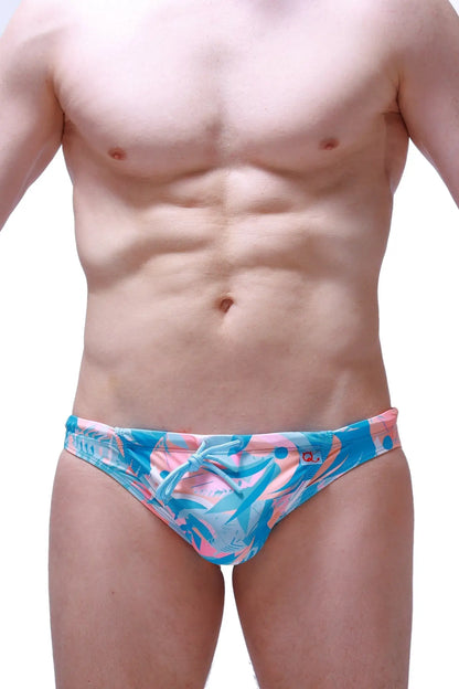 Swim bikini taik boucan vibrant blue and pink tropical leaf-patterned swim trunks with tied waistband