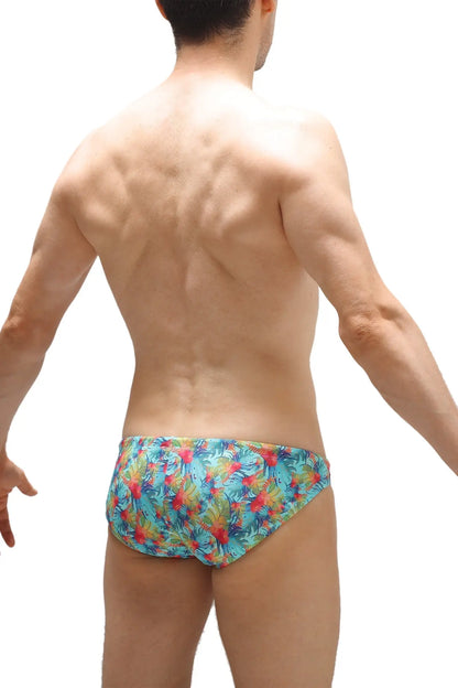 Swim bikini taik canot vibrant tropical print swim trunks in turquoise red and green hues for beachwear