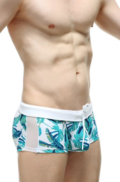 Men’s swim boxer macouba with tropical leaf pattern, white waistband, and mesh side panels for swimwear use