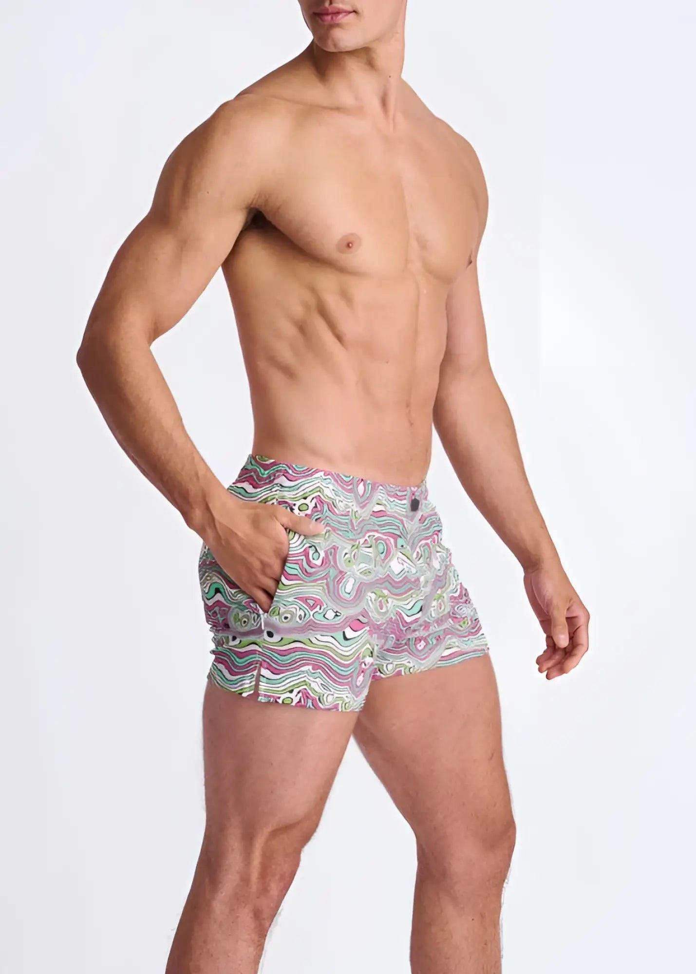 Men’s swirls print seersucker swim shorts with mesh lining featuring vibrant pink green and white swirl pattern