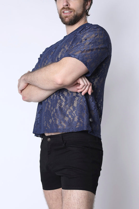 Midnight blue lace crop top with short sleeves and crew neck, paired with black shorts.