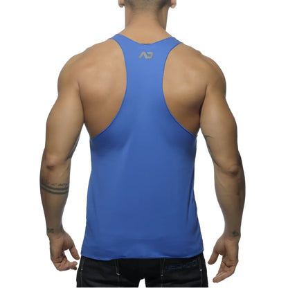 Blue athletic tank top with subtle gray logo on the upper back shown from the back side in tank back printed style