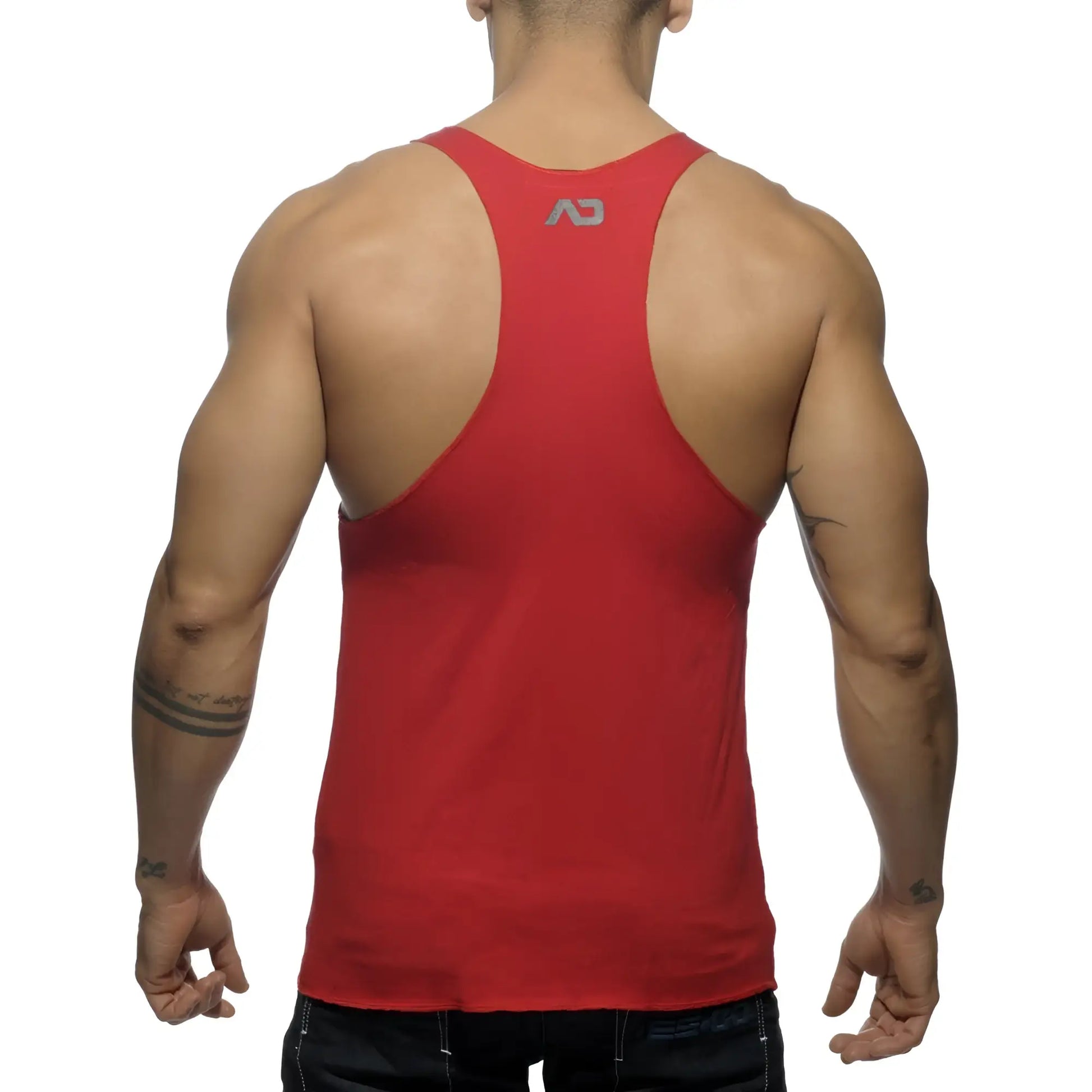 Red athletic tank top back view featuring a small gray logo on upper back in the tank back printed design