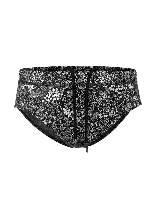 Black tartarus swim brief with white floral and bird pattern and drawstring waistband for beachwear