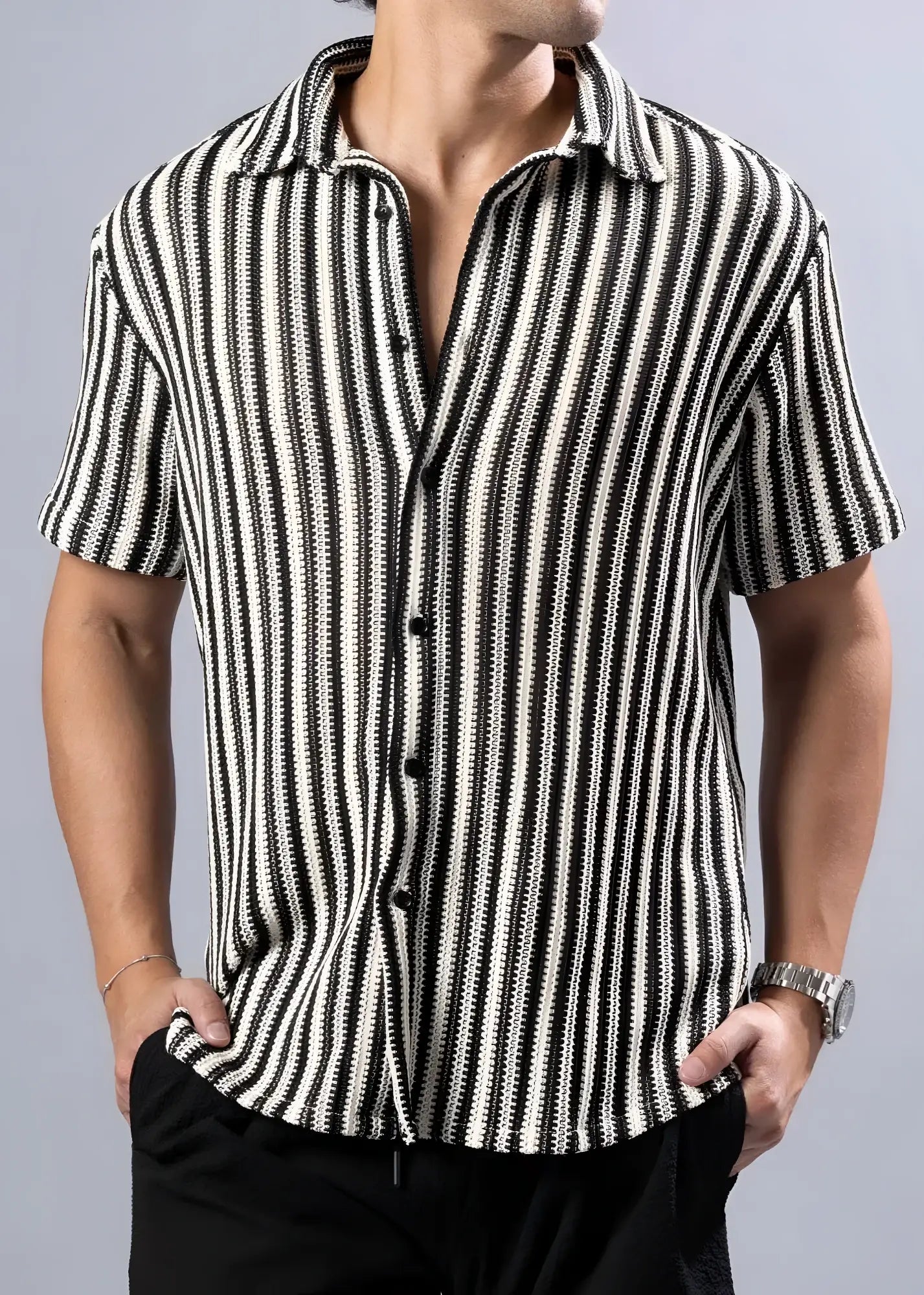 Black and white vertically striped short-sleeved button-up shirt with textured knit pattern called texture knit s/s shirt