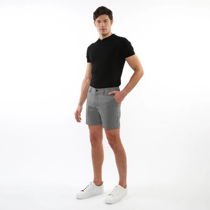 Men’s black short-sleeved polo shirt made of textured jacquard stretch fabric for comfortable casual wear