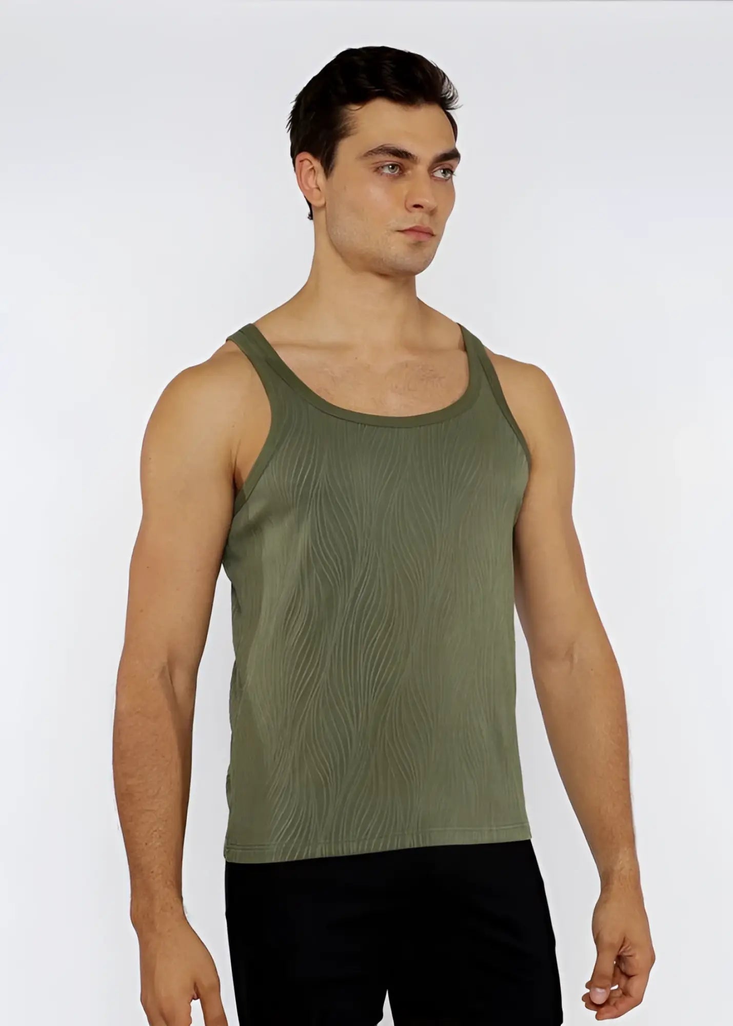 Olive green ribbed knit tank top with subtle wavy texture featuring a textured knit tank design