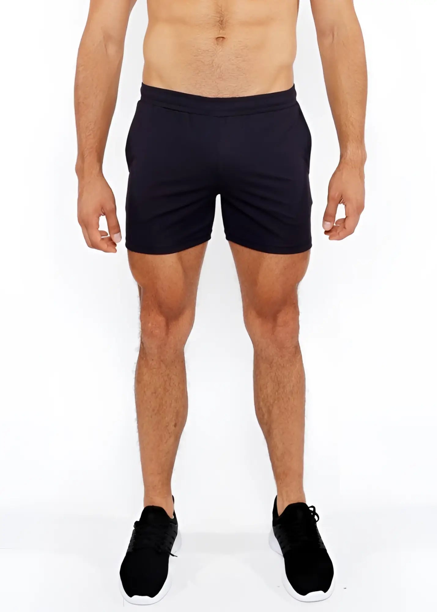 Black textured mesh stretch performance shorts with comfortable elastic waistband and minimalist design