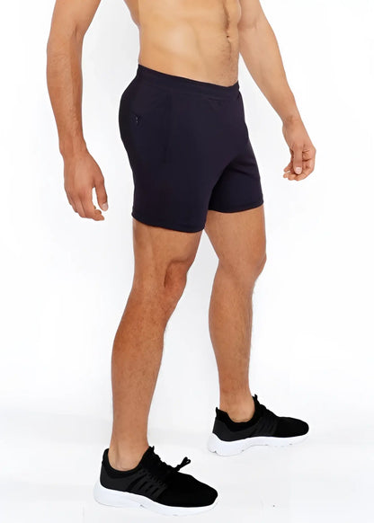 Black textured mesh stretch performance shorts with a sleek form-fitting design and subtle side pockets