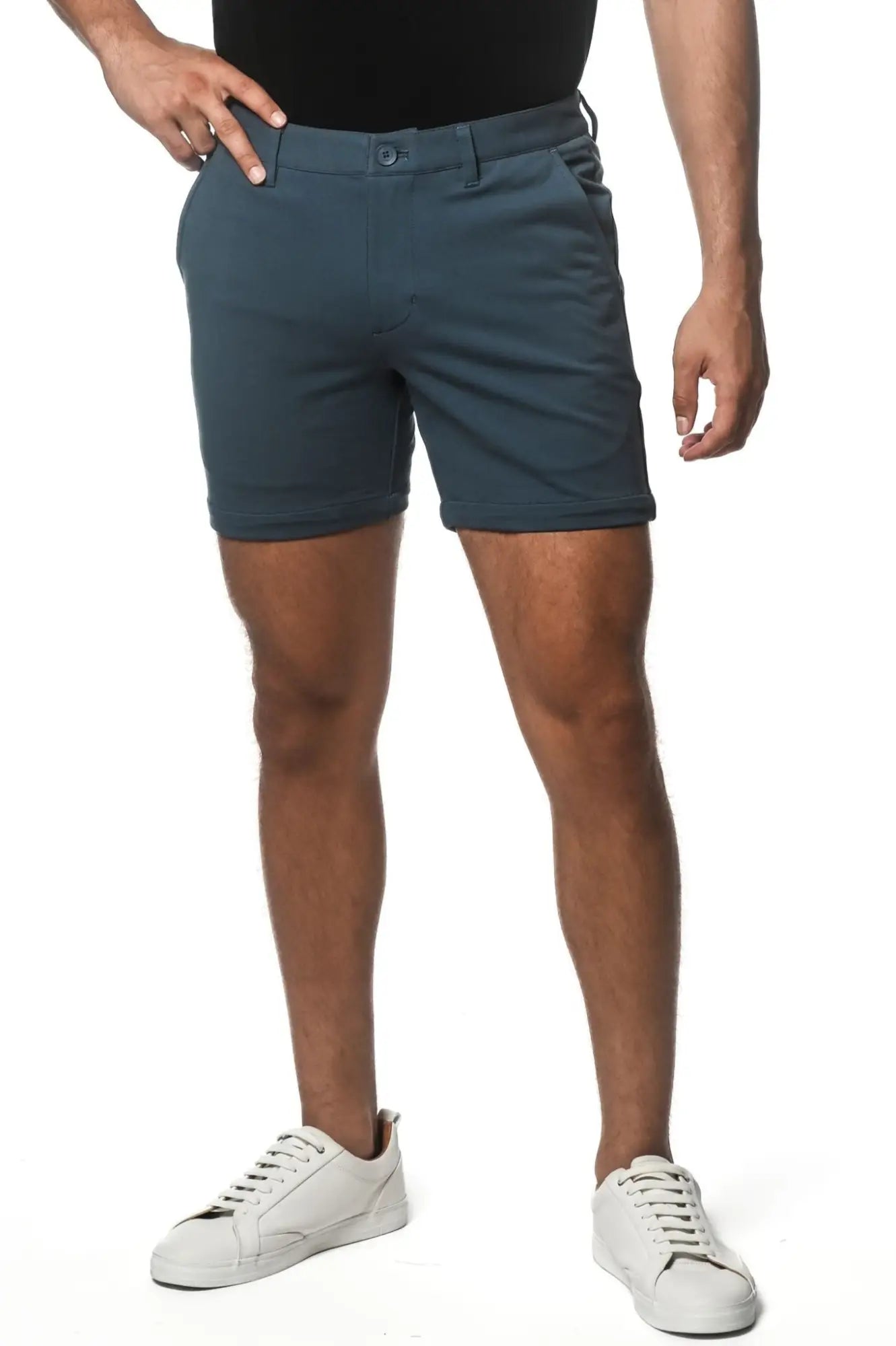 Dark teal textured stretch knit chino shorts with classic fit and button closure for comfortable casual wear