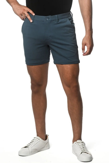 Dark teal textured stretch knit chino shorts with classic fit and button closure for comfortable casual wear