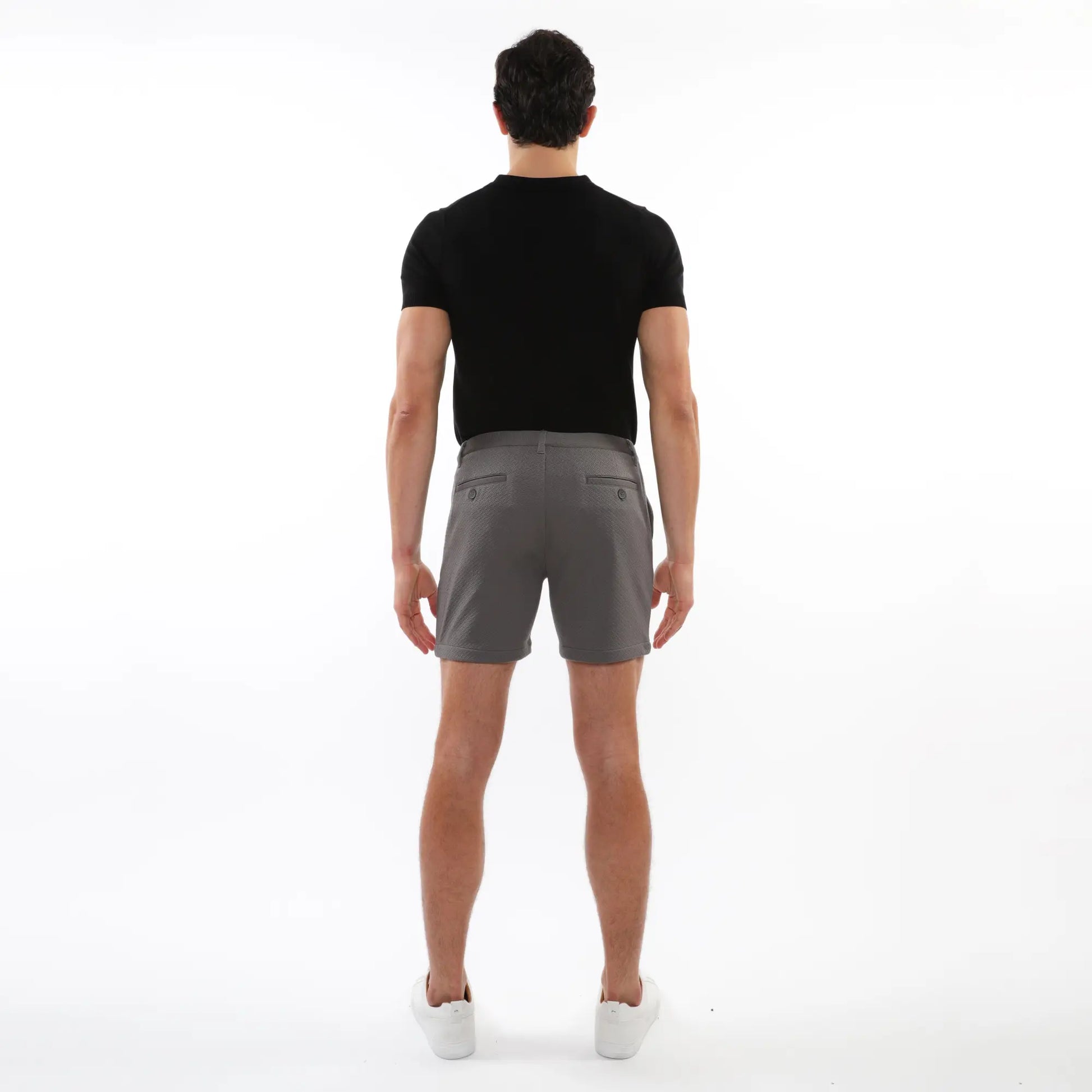 Gray textured stretch knit chino shorts with a sleek tailored fit and subtle side pockets for casual wear