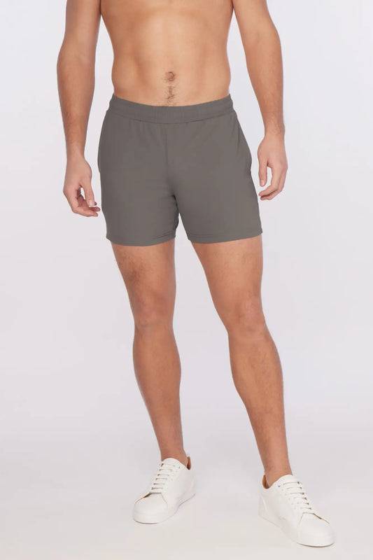 Gray textured stretch performance athletic shorts with a comfortable elastic waistband and subtle side pockets