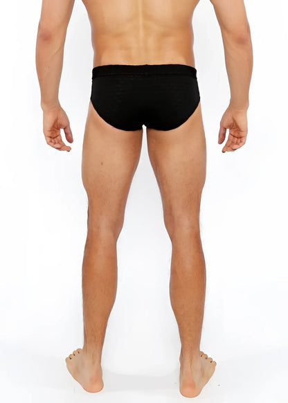 Black textured swim brief with front buckle made from durable fabric for stylish swimwear use