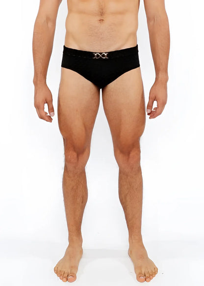 Black textured swim brief with a silver metallic double-x front buckle for stylish swimwear use