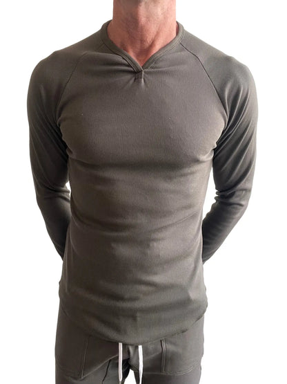 A sleek olive green thermal v neck long sleeve ribbed shirt with a fitted design for warmth and style