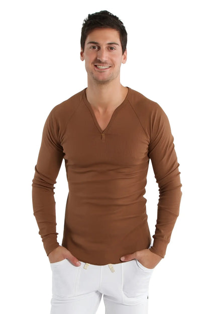 A slim-fitting chocolate thermal v-neck long sleeve shirt with subtle ribbed texture made for warmth and comfort