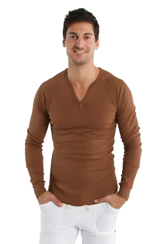 A slim-fitting chocolate thermal v-neck long sleeve shirt with subtle ribbed texture made for warmth and comfort
